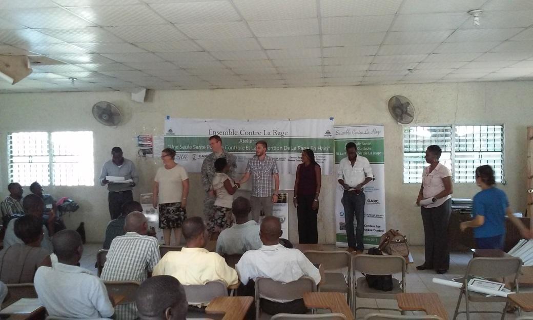 Justin Bergeron and team give certificates to new rabies control professionals